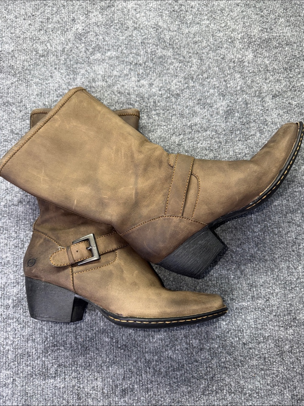 Børn "Mollie" mid-calf boots, distinguished by their rugged buckled strap detail